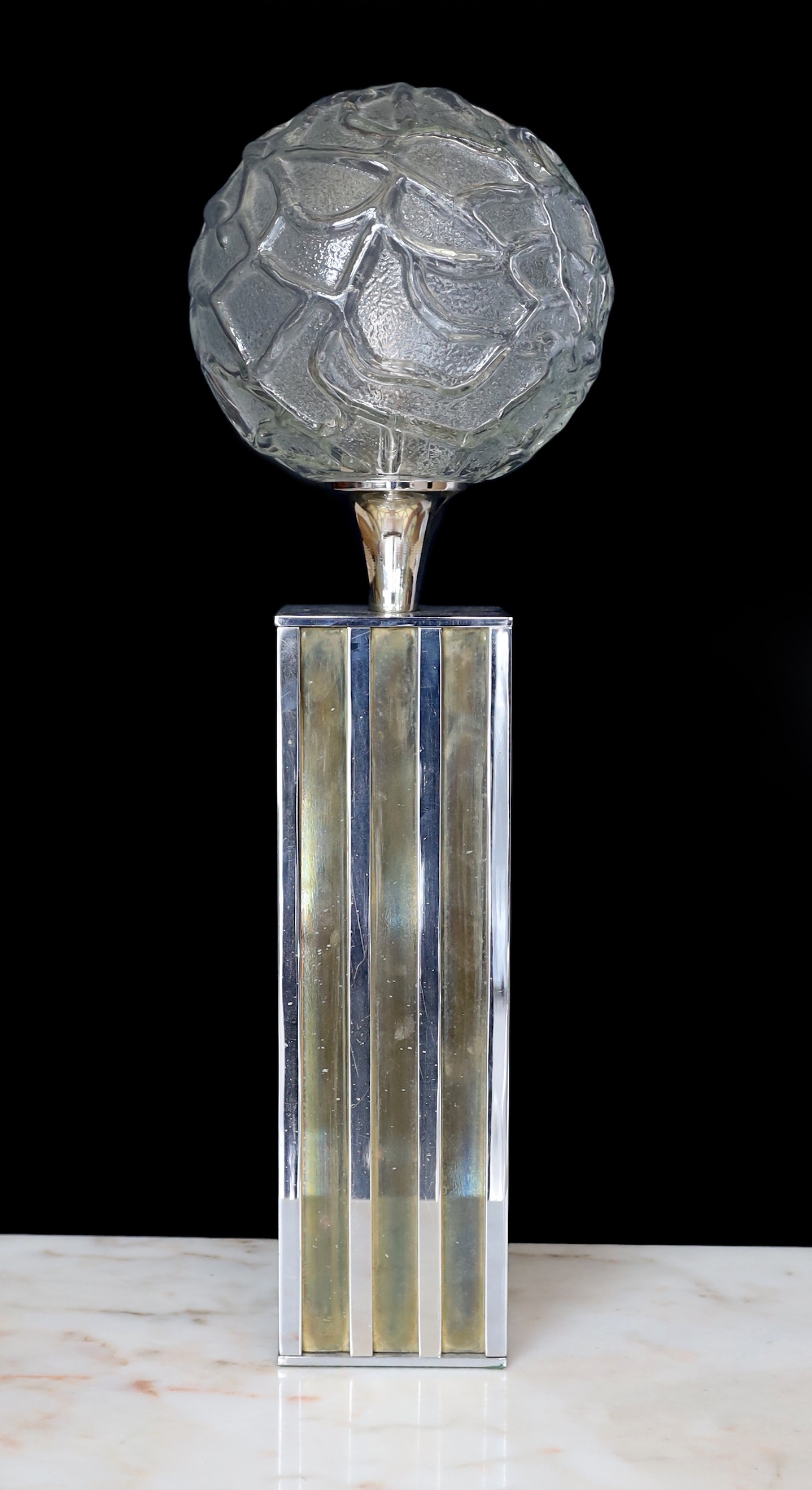 A 1960s Danish chrome plated table lamp with moulded globular shade, height 66cm